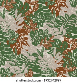 Seamless camouflage pattern with tropical leaves