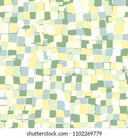 Seamless camouflage pattern. Variegated texture. Multicolored chaos. A grid of small elements.