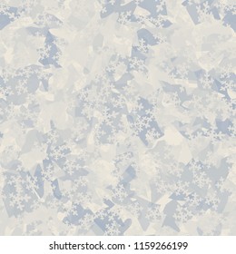 Seamless camouflage pattern of winter landscape colors. Chaotically located snowflakes are put on the picture.