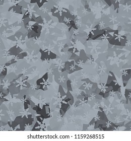Seamless camouflage pattern of winter landscape colors. In the picture are scattered snowflakes.