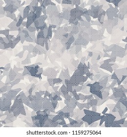 Seamless camouflage pattern of winter landscape colors. On the picture is imposed a texture of diagonally striped squares.