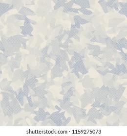 Seamless camouflage pattern of winter landscape colors. On the picture is imposed a texture of diagonally striped squares.