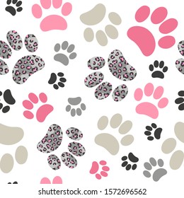 Seamless cats paws pattern with leopard print for kids design.