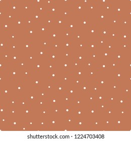 Seamless chaotic tileable polka dot pattern vector. Dotted background.