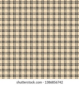 Seamless check plaid pattern graphic in black and beige for textile design. Hounds tooth texture.