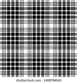 Seamless check plaid pattern. Hounds tooth plaid in black and white for skirt, coat, jacket, or other modern fashion textile design.