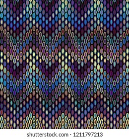 Seamless chevron geometric pattern, based on ikat fabric style. Vector image.
