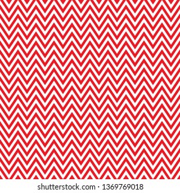 Seamless chevron pattern background texture in red. Ideal for Christmas wrapping paper print.