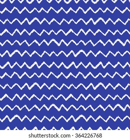 Seamless chevron pattern. Hand painted with oil pastel crayons. White stripes on black background. Design element for printables, wallpaper, baby shower invitation, birthday card, scrapbooking etc.