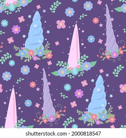 Seamless child pattern with multicolored unicorn horns with wreath of flowers and stars sparks on violet background. Rainbow decoration. Vector cartoon flat texture for wallpaper, fabric