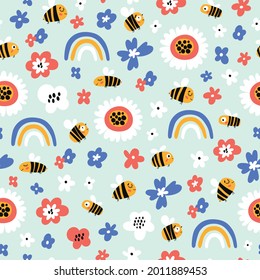 Seamless childish pattern with bee, flowers and rainbows in cartoon style. Perfect for wallpaper, fabric texture, wrapping paper