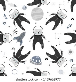 Seamless childish pattern with cat in the space, space ships, planets and comets. Design for fabric, wrapping, textile, wallpaper, apparel. Vector illustration.