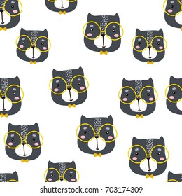 Seamless childish pattern with cute cat faces. Creative nursery background. Perfect for kids design, fabric, wrapping, wallpaper, textile, apparel