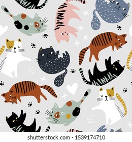 Seamless childish pattern with cute cats . Creative kids hand drawn texture for fabric, wrapping, textile, wallpaper, apparel. Vector illustration