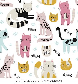 Seamless childish pattern with cute cats . Creative kids hand drawn texture  Vector illustration