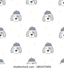 Seamless childish pattern with cute dog faces. Perfect for kids design, fabric, wrapping, wallpaper, textile, apparel. Creative nursery background. 