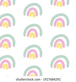 Seamless childish pattern with cute rainbow. Creative scandinavian kids texture for fabric, wrapping, textile, wallpaper, apparel. Vector illustration