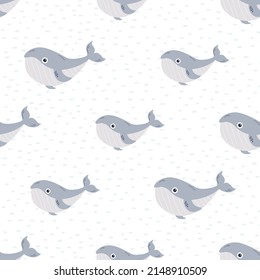 Seamless childish pattern with cute whales for nursery, baby shower, textile.