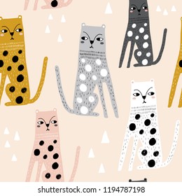 Seamless childish pattern with funny leopards. Creative scandinavian kids texture for fabric, wrapping, textile, wallpaper, apparel. Vector illustration