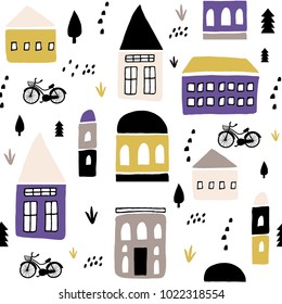 Seamless childish pattern with hand drawn houses. Creative kids city texture for fabric, wrapping, textile, wallpaper, apparel. Vector illustration