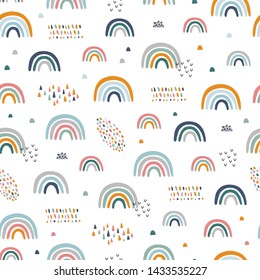 Seamless childish pattern with hand drawn rainbows. Creative scandinavian kids texture for fabric, wrapping, textile, wallpaper, apparel. Vector illustration
