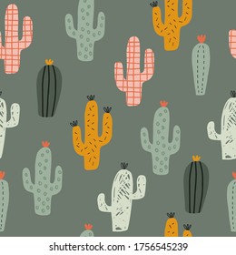 Seamless childish pattern with hand drawn cactuses.  Creative scandinavian kids texture for fabric, wrapping, textile, wallpaper, apparel. Vector illustration. Red, yellow and green.