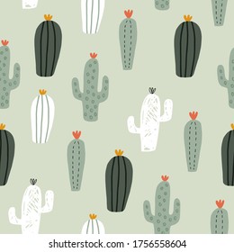 Seamless childish pattern with hand drawn cactuses.  Creative scandinavian kids texture for fabric, wrapping, textile, wallpaper, apparel. Vector illustration. Red, yellow and green.