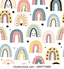 Seamless childish pattern with hand drawn rainbows. Scandi nursery background. Trendy baby texture for fabric textile wallpaper apparel wrapping.