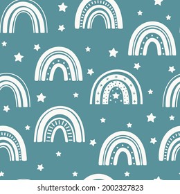 Seamless childish pattern with hand drawn rainbows and stars. Monochrome scandi nursery background. Trendy baby texture for fabric textile wallpaper apparel wrapping.