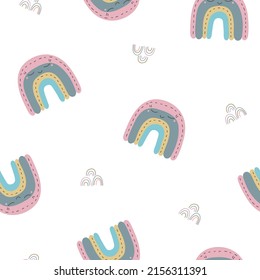 Seamless childish pattern with hand drawn cute rainbows. Vector illustration isolated on white background for nursery and textile decoration
