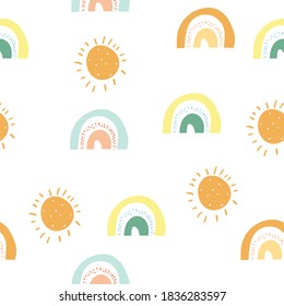 Seamless childish pattern with hand-drawn rainbow and sun vector illustration. Good for kids theme, textile, fabric, stationary, wrapping wrap, card.