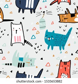 Seamless childish pattern with ink drawn cats in different poses. Creative kids hand drawn texture for fabric, wrapping, textile, wallpaper, apparel. Vector illustration