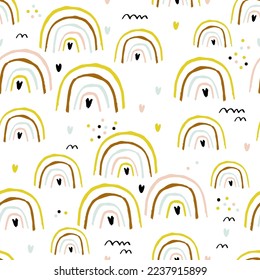 Seamless childish pattern with ink drawn rainbows and hearts .Creative scandinavian kids texture for fabric, wrapping, textile, wallpaper, apparel. Vector illustration