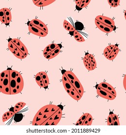 Seamless childish pattern with ladybirds in cartoon style. Perfect for wallpaper, fabric texture, wrapping paper