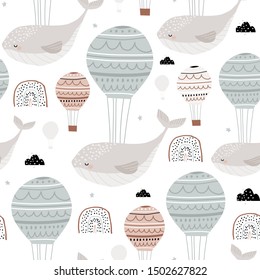 Seamless childish pattern with sleeping whales hot air balloons. Creative kids hand drawn texture for fabric, wrapping, textile, wallpaper, apparel. Vector illustration