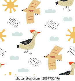 Seamless children pattern bird woodpecker sun. Naive Digital paper, wallpaper for nursery room, baby textile fabric. Baby Shower hand drawn doodle vector design