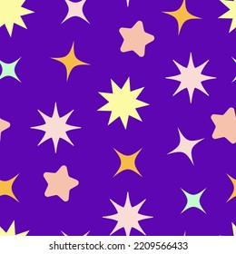 Patrón infantil sin foco sobre un fondo morado. Estrellas de diversas formas.