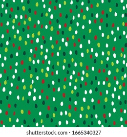 Seamless Christmas background with abstract dots red and green color