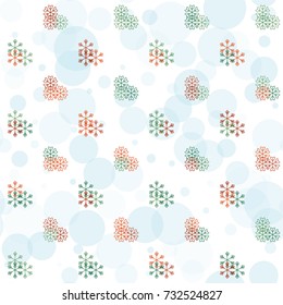 Seamless Christmas background with random scatter falling colorful snowflakes and blue polka dots isolated on white.