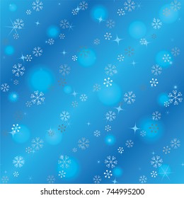 Seamless Christmas background with random scatter falling silver snowflakes, blue blurred lights and sparkles on a blue background
