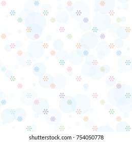Seamless Christmas background with random scatter falling colorful snowflakes and blue polka dots isolated on white.