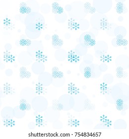 Seamless Christmas background with random scatter falling turquoise snowflakes and blue polka dots isolated on white.