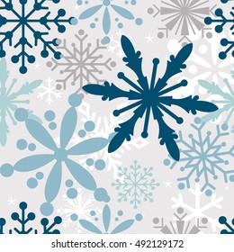 Seamless Christmas background with snowflake design