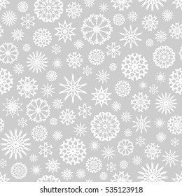 Seamless Christmas background with white snowflakes. Template from snowflakes for your Christmas design. Seamless Christmas pattern with snowflakes