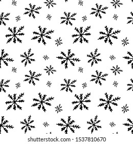 Seamless Christmas and New Year pattern with snowflakes in different forms. Seamless pattern with different black holidays icons on white background. 