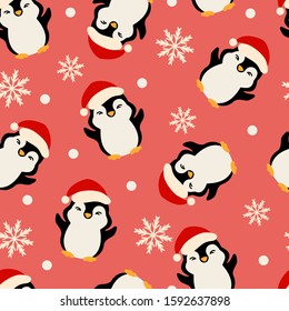 Seamless christmas new year pattern with funny penguins and snowflakes on red background