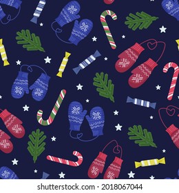 Seamless Christmas and New Year pattern. Warm crocheted winter mittens and various sweets. vector design template.