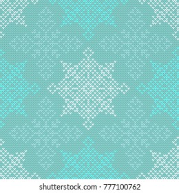 Seamless Christmas nordic knitting vector pattern with colorful snowflakes on light green background
