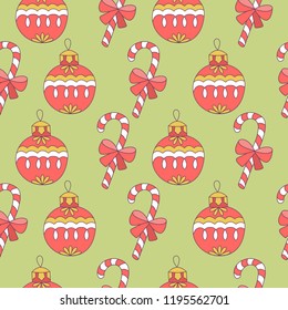 Seamless Christmas pattern. Christmas balls and striped lollipops. On a light green background. Vector illustration.