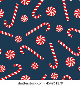 Seamless Christmas pattern with candy cane and lollipop. Happy New Year and Merry Xmas background. Vector winter holidays print for textile, wallpaper, fabric, wallpaper. 